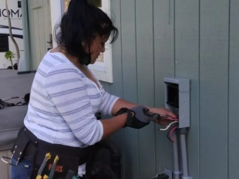 Licensed electrician wiring an exterior subpanel in Moosic